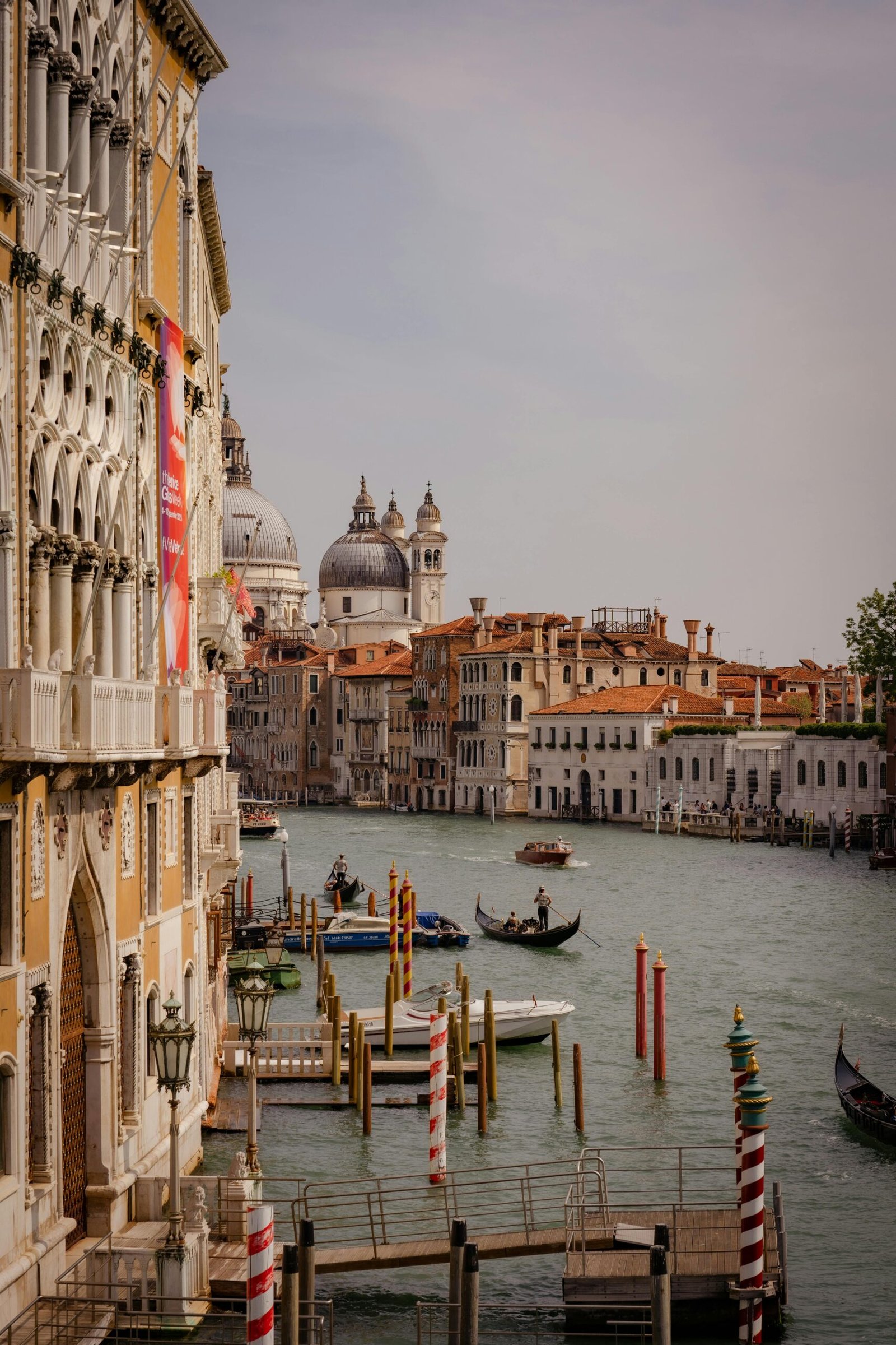 Scenic Venice Grand Canal with gondolas and historic buildings. Ideal for travel imagery